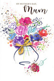 This Mother's Day card features an exuberant floral illustration, rendered in swirling layers of watercolour that flow together like a freshly gathered bouquet. Rich purples, spirited pinks, and bright cerise reds form the heart of the arrangement, each bloom softly edged where the pigment meets the paper, giving the impression of velvety petals just opening. Cooler tones of blue and hints of turquoise weave between them, providing balance and depth, much like the varied flowers found in artisan arrangements from independent Hampstead florists. Delicate gold accents pick out the contours of a few petals and leaves, creating a quiet glimmer that suggests the glow of candlelight on a family dining table. The flowers rise from a simple, curving vase, loosely defined by gentle strokes and gathered at the neck with an elegant golden bow that recalls the soft rustle of ribbon being tied before a delivery goes out across Hampstead and West Hampstead. All around the bouquet, tiny flecks of colour and airy splatters hover in the white space, like petals tossed into the air during a celebration or the joyful chaos of children helping to arrange flowers for their mum. The overall mood is both airy and heartfelt, capturing a sense of gratitude, warmth, and playful affection. It feels like a visual hug, perfect for expressing love on Mother's Day to mothers and grandmothers across the quiet terraces and bustling cafés of NW3.